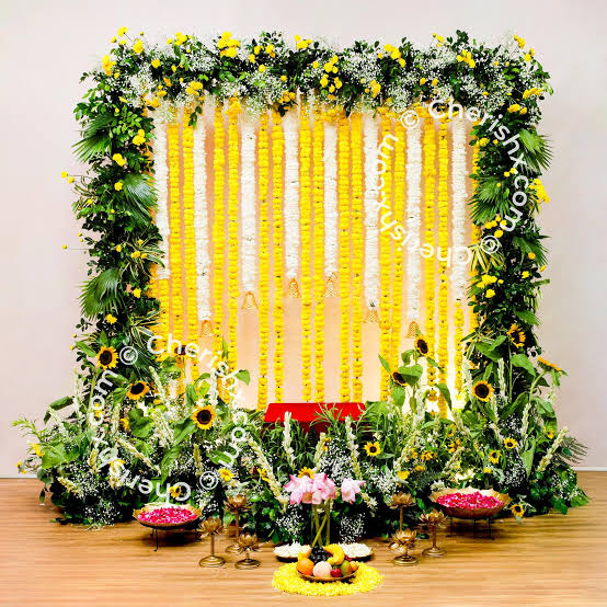 Floral decoration with fresh flower arrangements and floral wall